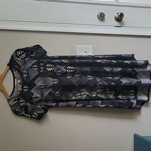 EUC Lularoe Carly Swing T-shirt Dress in Black and Yellow Geometric Print